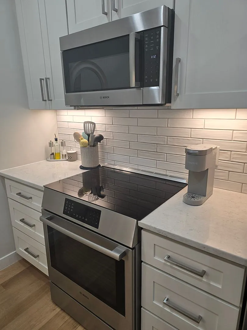 Sleek First-Floor Condo with Park-View Patio & High-End Finishes — Photo 3