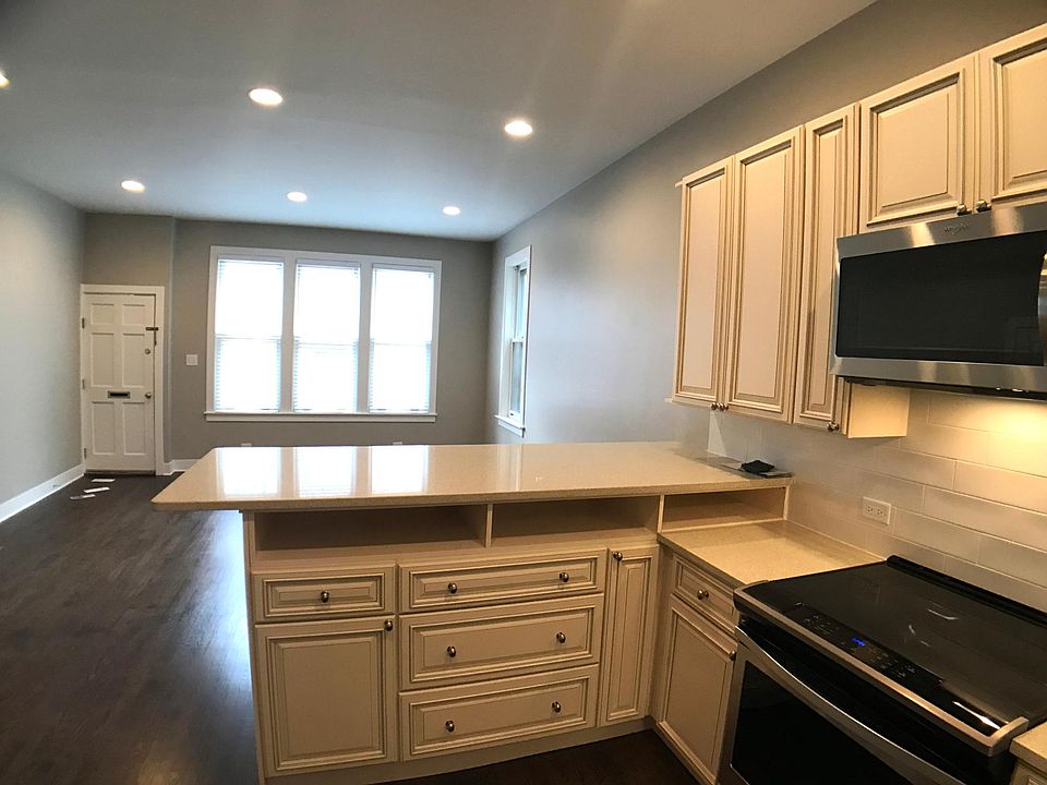 Brand new Kitchen, quartz eat in counter, looking out toward