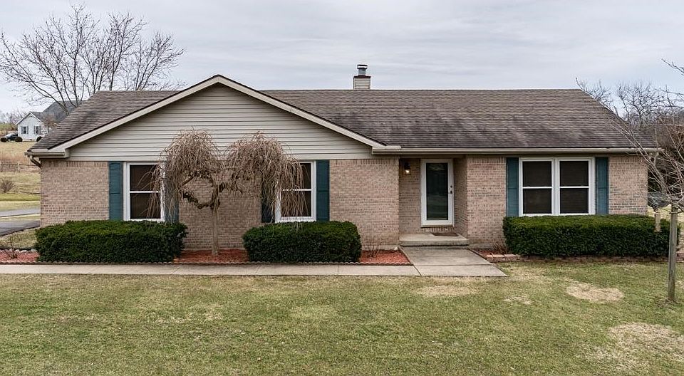 Beautifully maintained brick ranch on just over an acre of land. Enjoy country living AND easy access to the highway, Cincinnati, and Dayton.