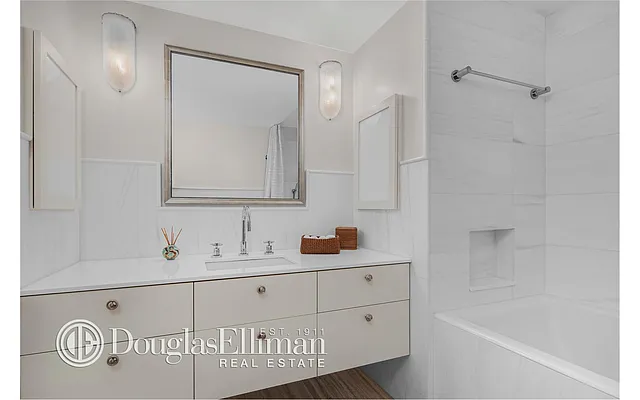 Sold by Douglas Elliman | media 13