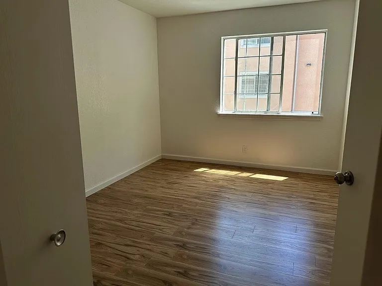 Bedroom with easy to slide window