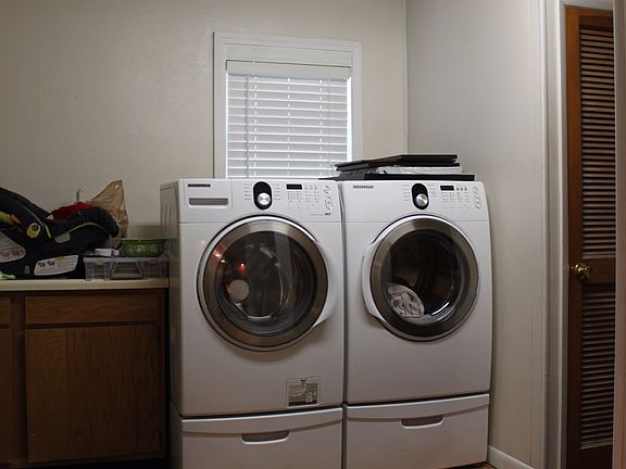 Laundry room with half bath