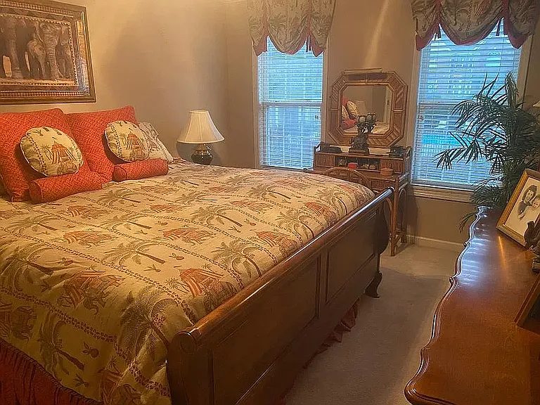 Upper sleeping level Master BR featuring ceiling Fan and Tray ceiling