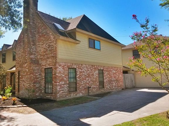 Long driveway provides extra parking.