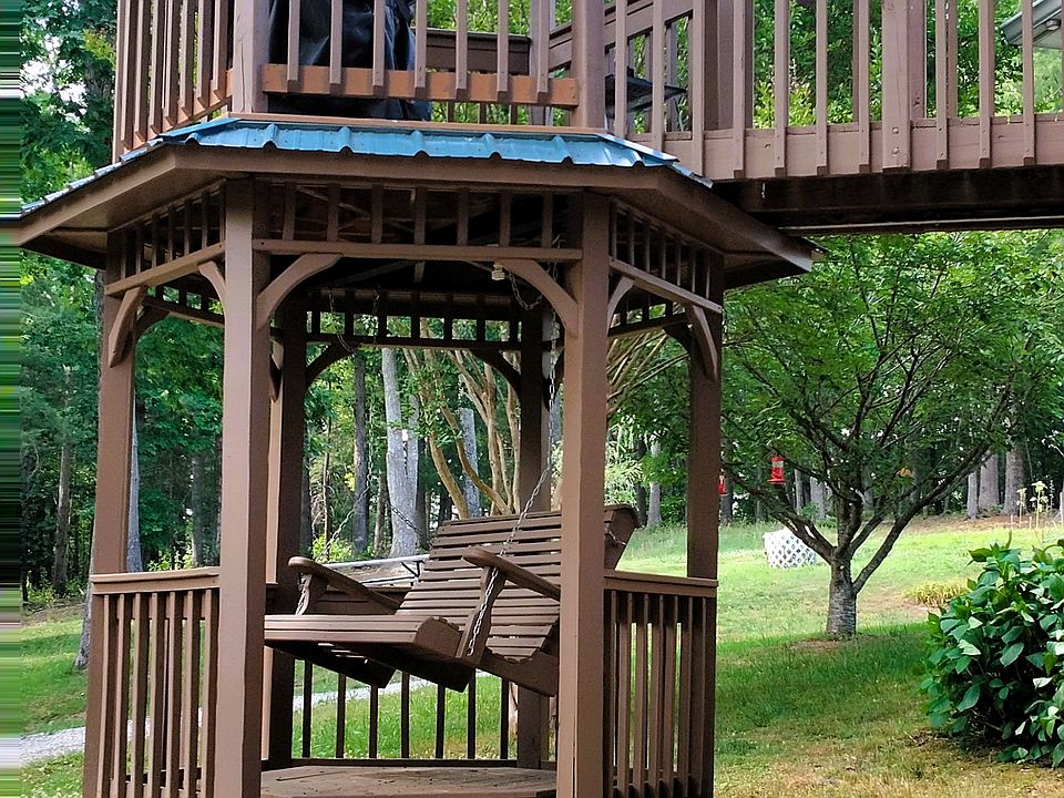 2 Story Gazebo with a relaxing swing on the lower, and Grill on the upper with a cat walk that leads to the enclosed porch for entertaining.