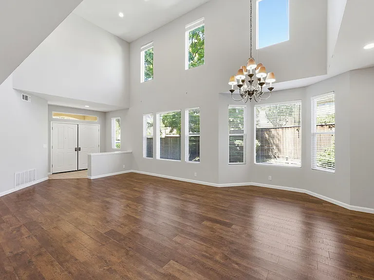 Two story living and formal dining space