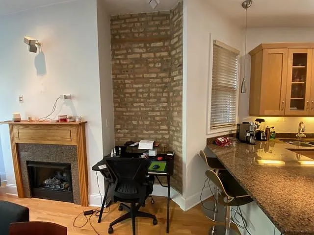 Gas FP, exposed brick wall