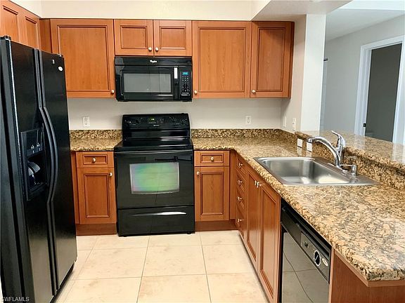 4th image of 10115 Villagio Palms Way Unit 104