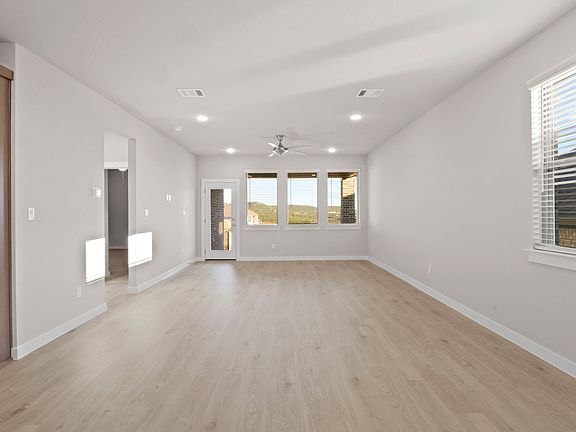 Living Room in the Willow home plan by Trophy Signature Homes - REPRESENTATIVE PHOTO