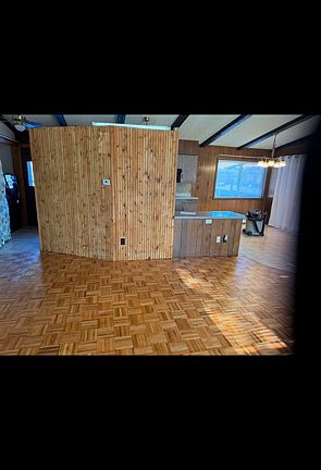 Dining room on R, Kitchen behind this wall, which contains appliances