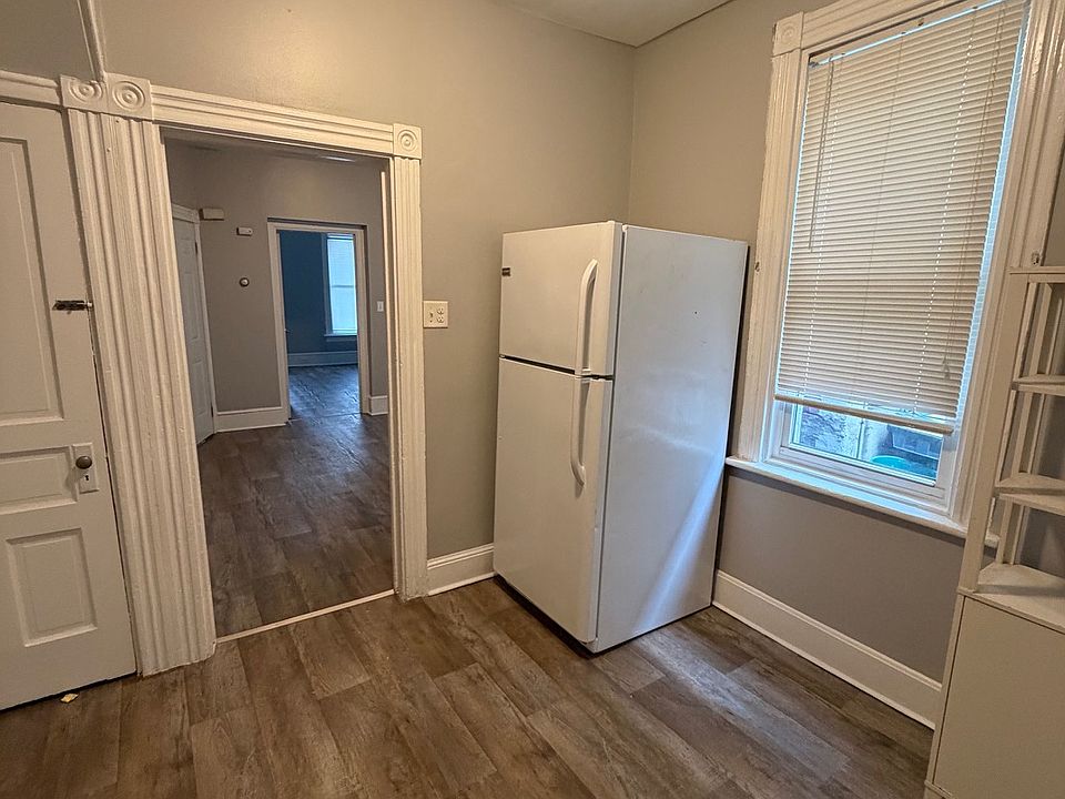 Basement door on left and right door leading to living room.