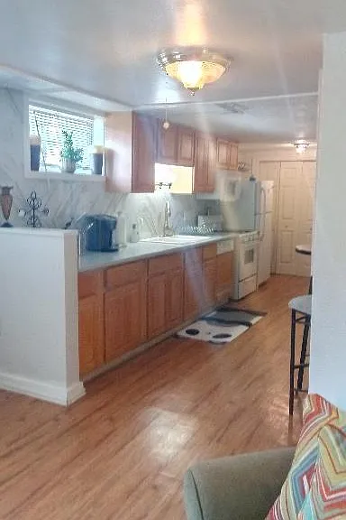 Spacious kitchen with quartz and marble.