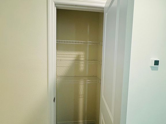Linen closet by AC controller