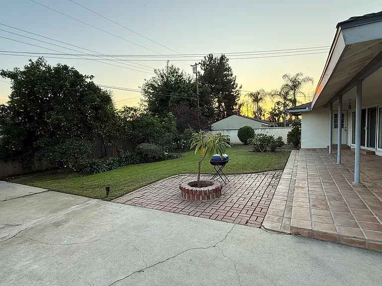 BACKYARD IS PERFECT FOR PETS FRIENDLY AS IS ALL BLOCK WALLS AND FENCED