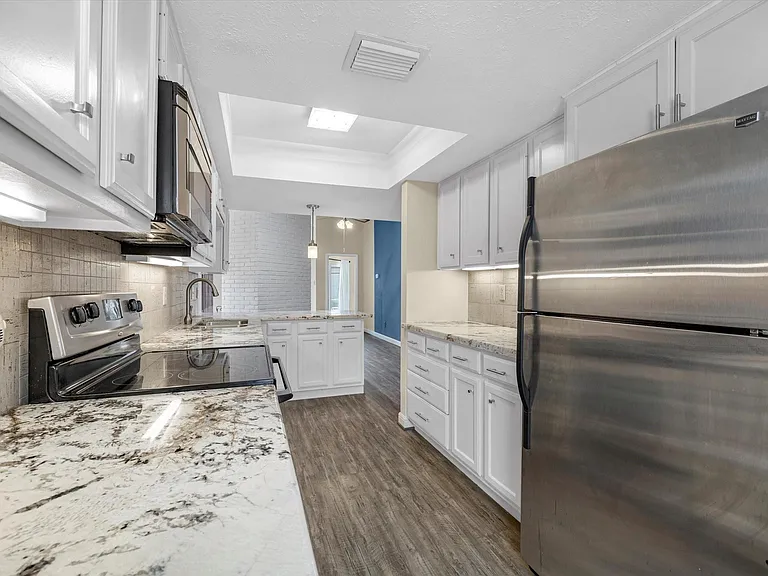 8327 Silvan Wind Ln — Photo 11