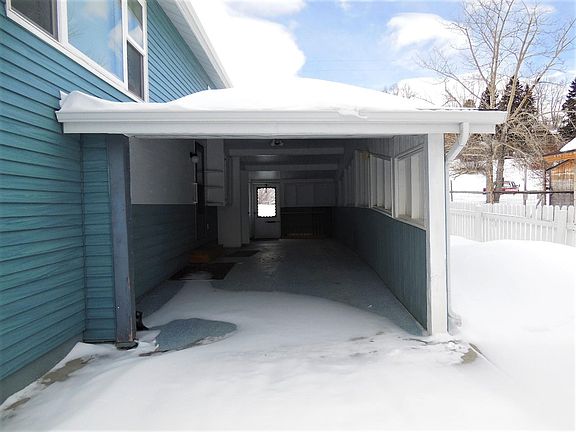 Enclosed Carport to keep your vehicle snow free!