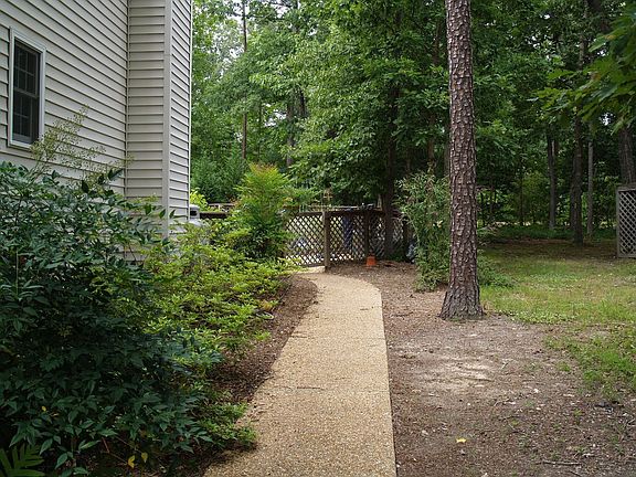 Sidewalk to backyard entrance