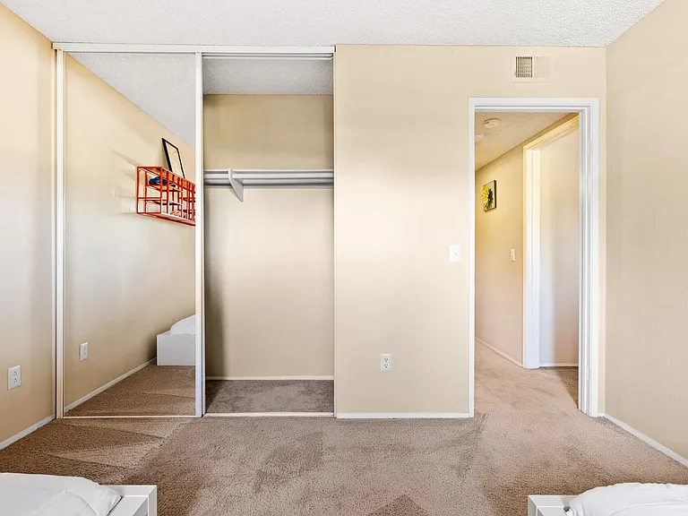 Large closet in secondary bedroom at River Oaks in Oceanside, CA