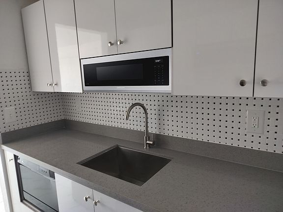 Kitchen - New Appliances, includes dishwasher and microwave.