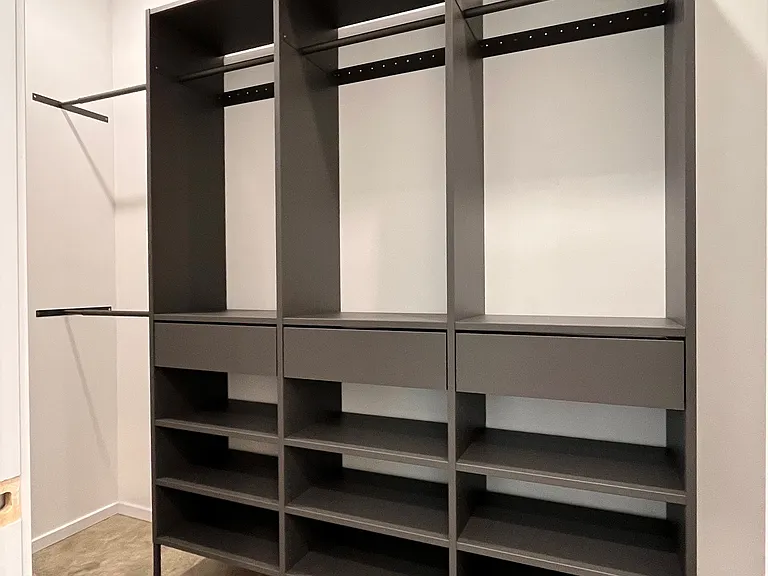 Primary walk-in closet with built-ins