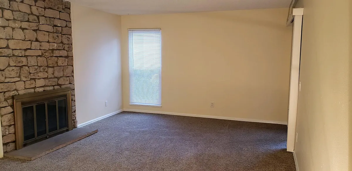 Full living room with fireplace - 6470 S Dayton St #K05