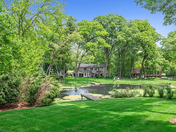 From the deck and sunroom, you have this great view of the pond.  And in the winter, its great for ice skating.