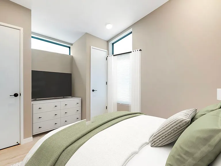 Freestanding home bedroom with hard surface flooring