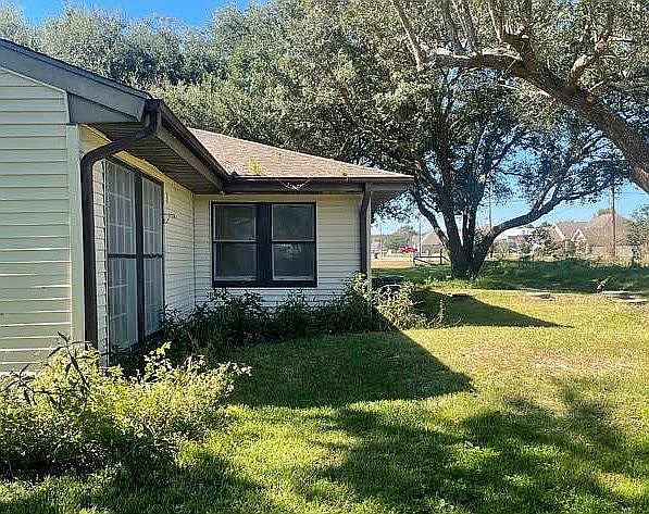 Side of house and yard