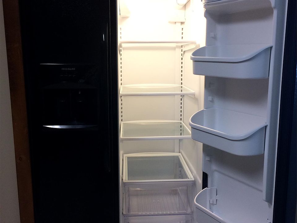 Nice, clean appliances including water dispenser on the door with filtered water.