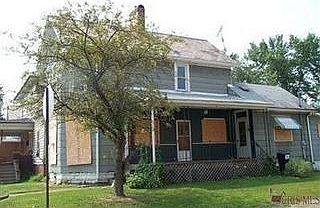 1st image of 303 W 3rd St