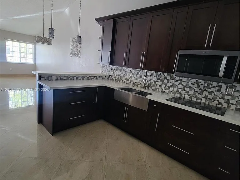 7191 W 24th Ave #Penthouse 50-5 — Photo 7