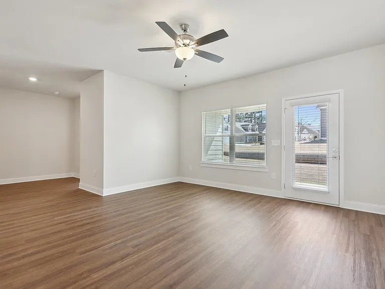 Interior view of the living room with direct access to the patio.