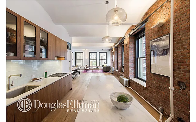 Sold by Douglas Elliman | media 13