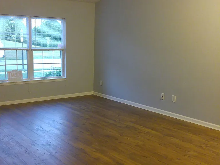LIVING ROOM AND FORMAL DINING AREA NEW FLOORING AND PAINT