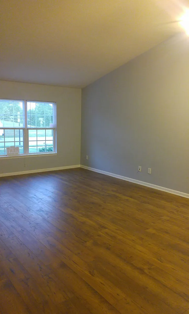 LIVING ROOM AND FORMAL DINING AREA NEW FLOORING AND PAINT - 4104 Ballybay Ln