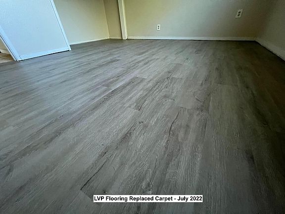 The carpet was replaced with waterproof LVP flooring in the main living area in July 2022