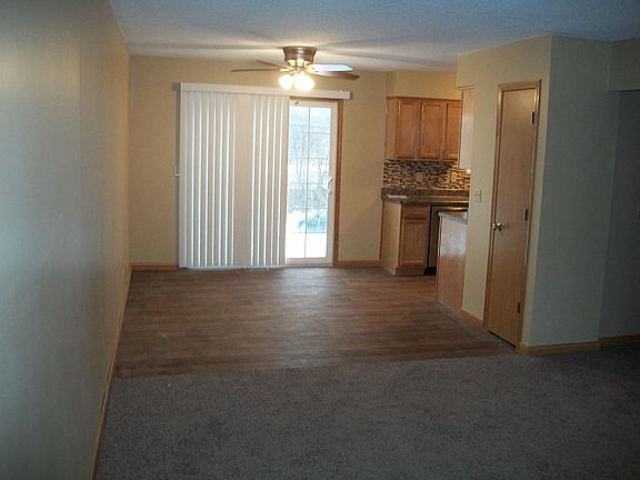 view from living into dining room and kitchen