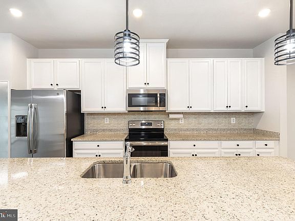 4th image of 9728 Cedarmass Cir