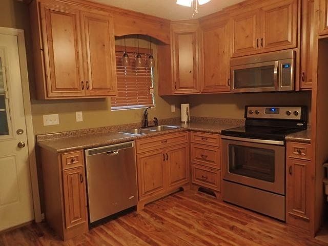 Remodeled Kitchen with New Flooring and Custom Cabinetry, Stainless Appliances