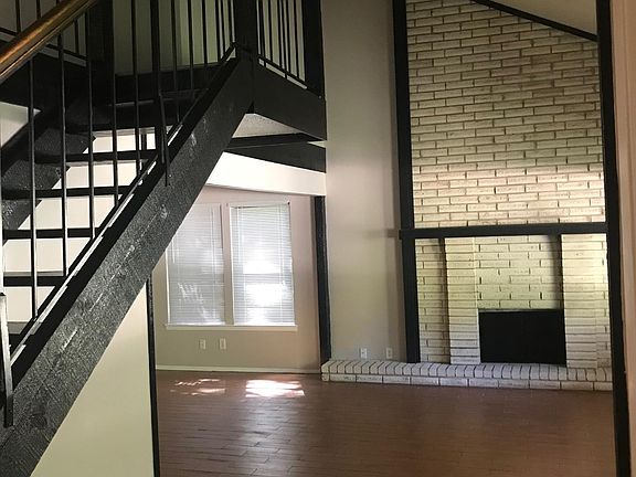 Living area with vaulted ceiling