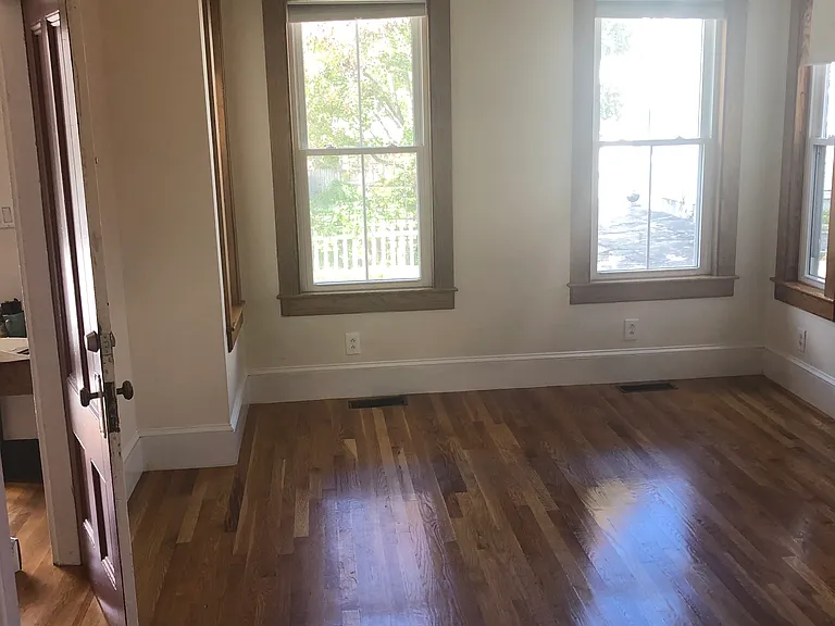Living room showing front of house