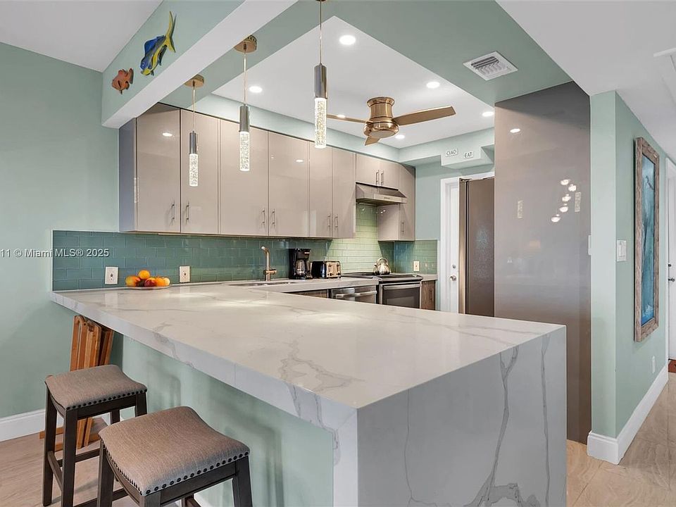 1st image of 2751 N Palm Aire Dr APT 410