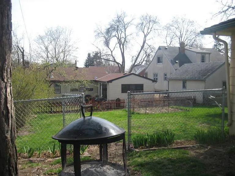 Fenced in backyard, enough space for gardening and play area