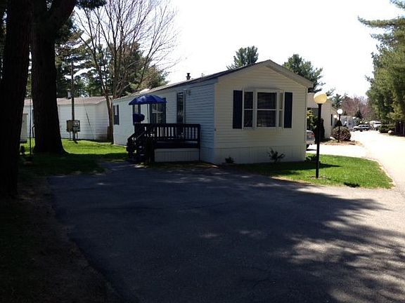 front with long driveway 