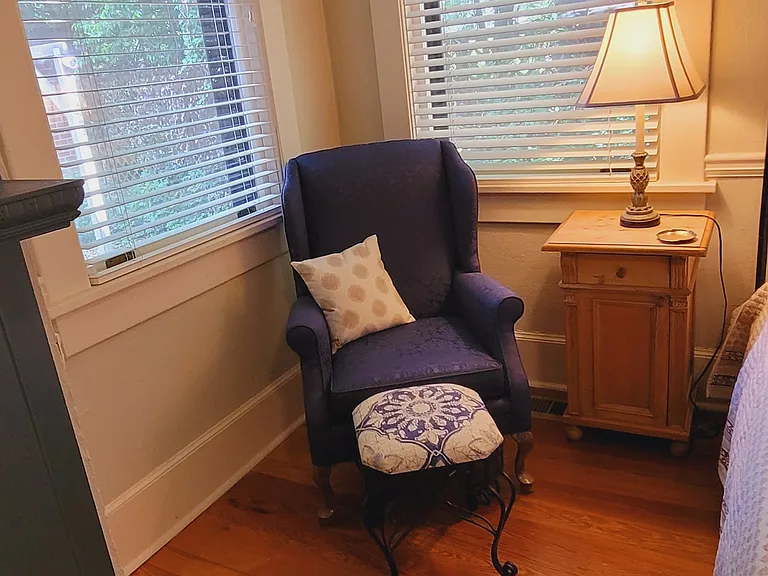 Corner windows with lots of light in second bedroom on main floor