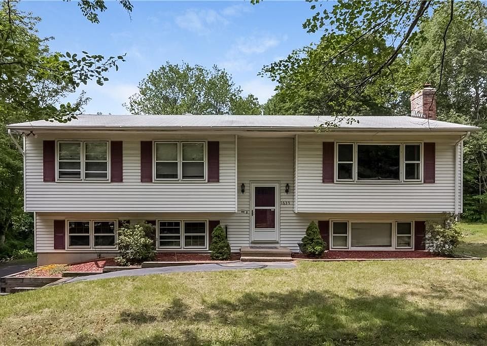 WELCOME HOME... featuring 8 rooms - 3 bedrooms, 2 1/2 baths on 1.6 acre lot