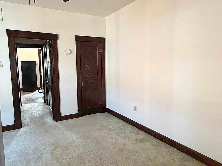 Bedroom upon walking out of living room.