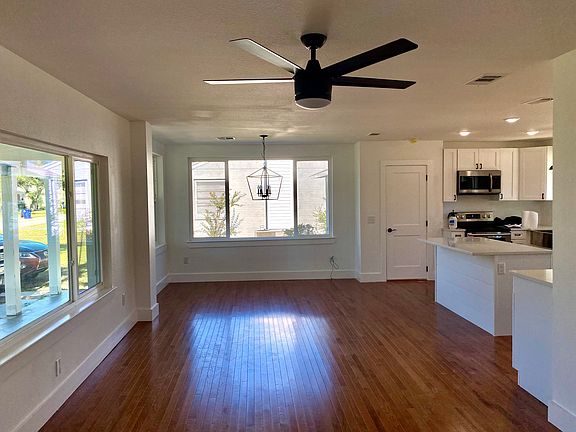 Open living room, dining and kitchen