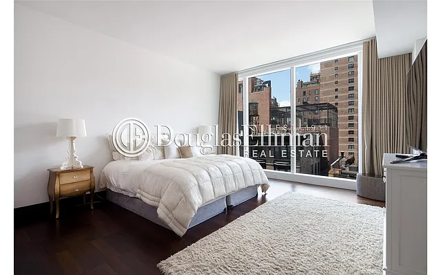 Sold by Douglas Elliman | media 18