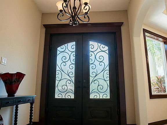 Large entry with chandelier.